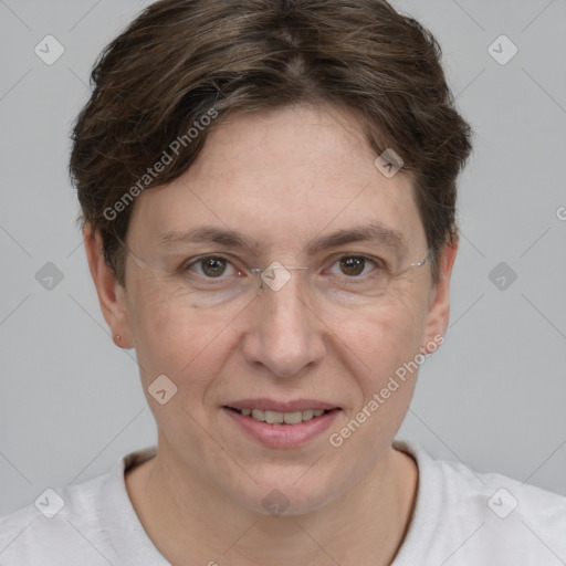 Joyful white adult female with short  brown hair and brown eyes