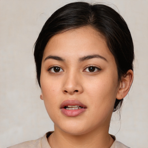 Neutral white young-adult female with medium  black hair and brown eyes