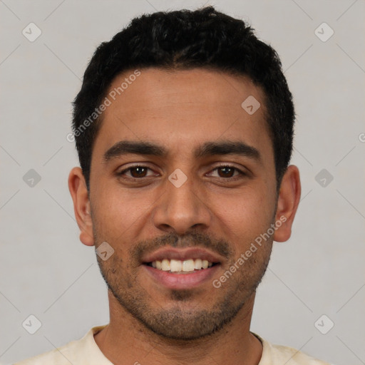 Joyful latino young-adult male with short  black hair and brown eyes