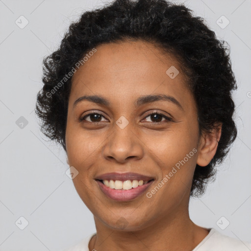 Joyful latino young-adult female with short  brown hair and brown eyes