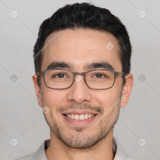 Joyful white young-adult male with short  black hair and brown eyes