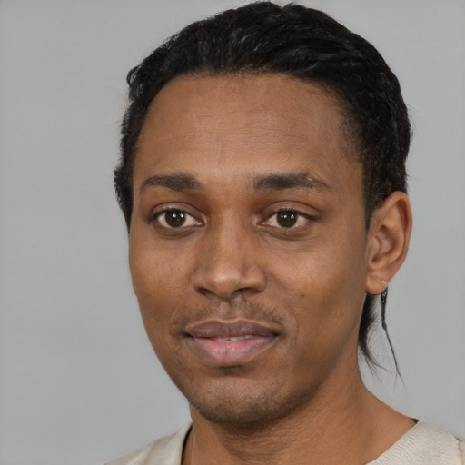 Neutral black young-adult male with short  black hair and brown eyes