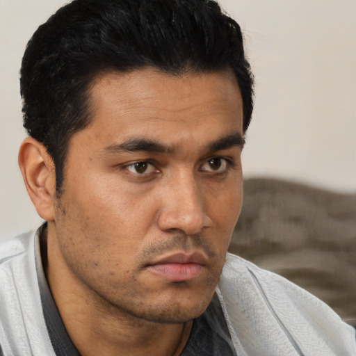 Neutral asian young-adult male with short  black hair and brown eyes