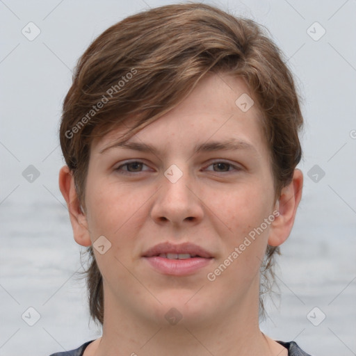 Joyful white young-adult female with short  brown hair and grey eyes