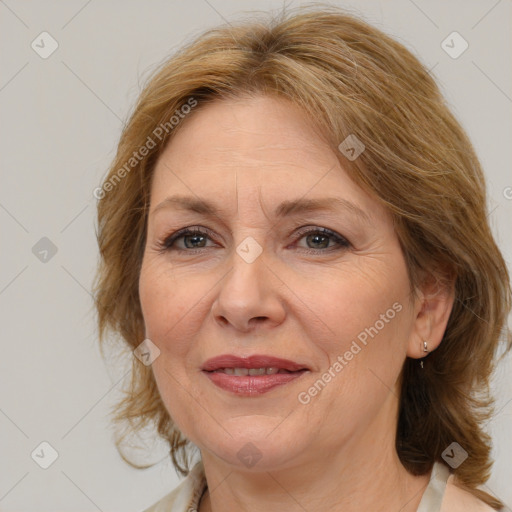 Joyful white adult female with medium  brown hair and brown eyes