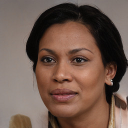 Joyful black young-adult female with medium  brown hair and brown eyes