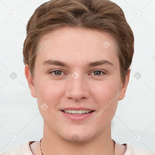 Joyful white young-adult female with short  brown hair and grey eyes