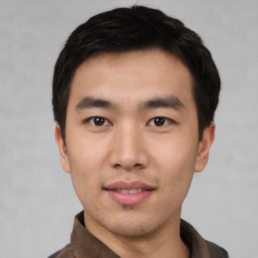Neutral asian young-adult male with short  black hair and brown eyes