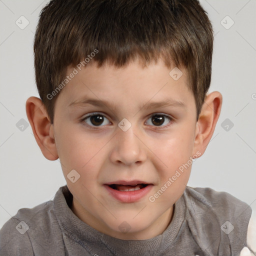 Joyful white child male with short  brown hair and brown eyes