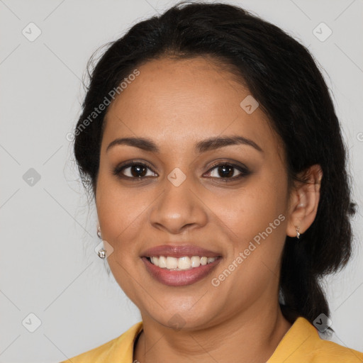 Joyful latino young-adult female with long  brown hair and brown eyes