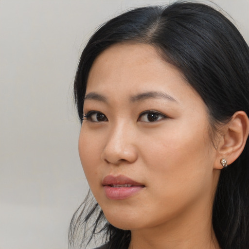 Neutral asian young-adult female with long  black hair and brown eyes