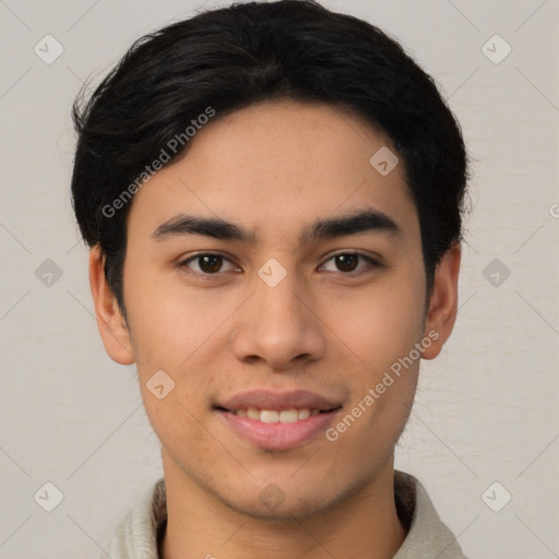 Joyful asian young-adult male with short  black hair and brown eyes