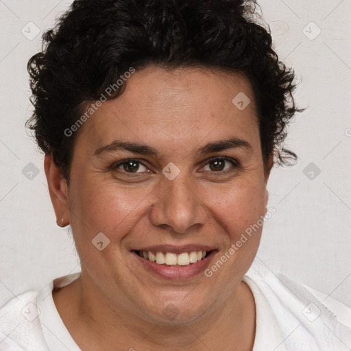 Joyful white adult female with short  brown hair and brown eyes