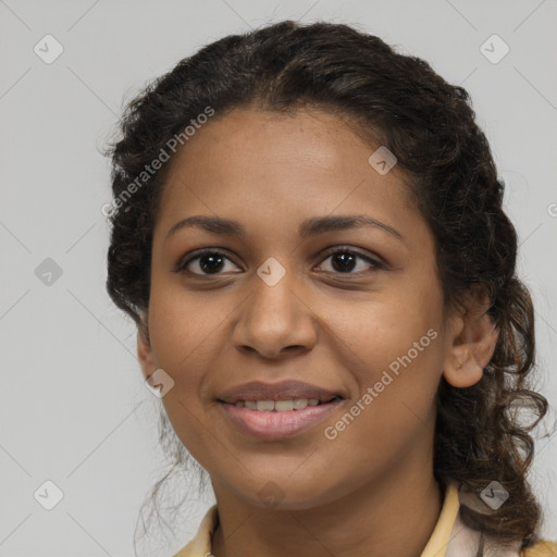 Joyful latino young-adult female with long  brown hair and brown eyes