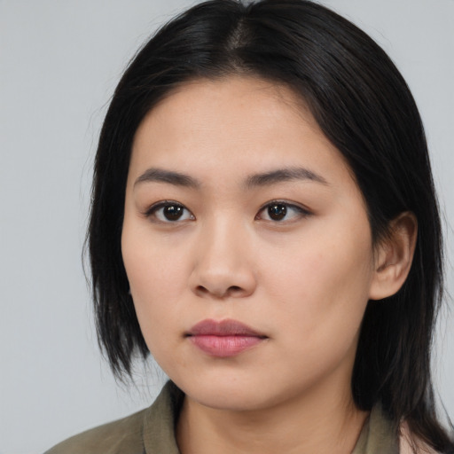 Neutral asian young-adult female with medium  black hair and brown eyes