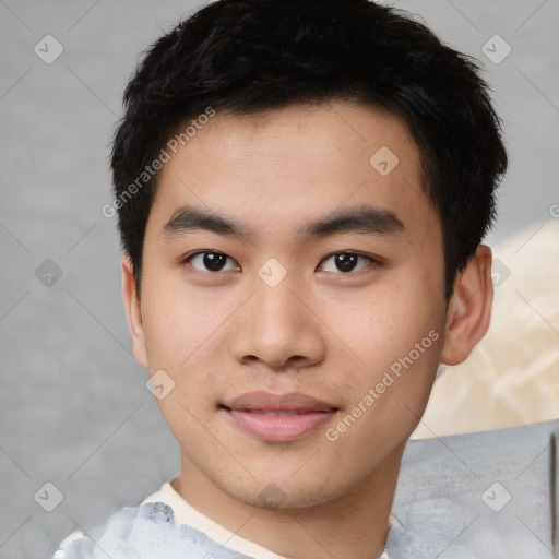 Joyful asian young-adult male with short  black hair and brown eyes