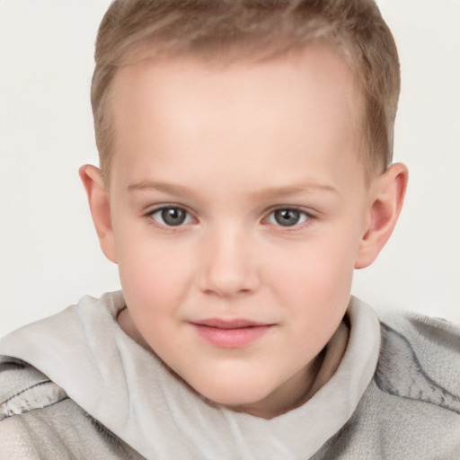 Joyful white child female with short  brown hair and grey eyes