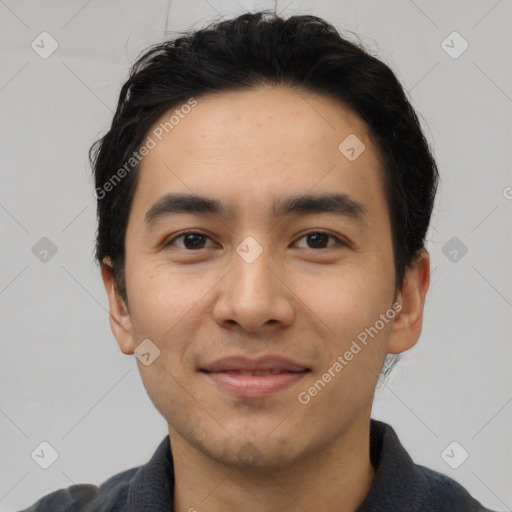 Joyful latino young-adult male with short  black hair and brown eyes