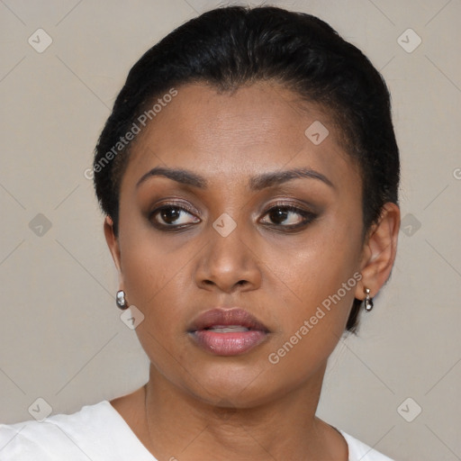 Neutral black young-adult female with short  black hair and brown eyes