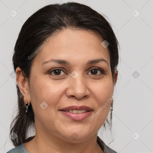 Joyful white adult female with medium  brown hair and brown eyes