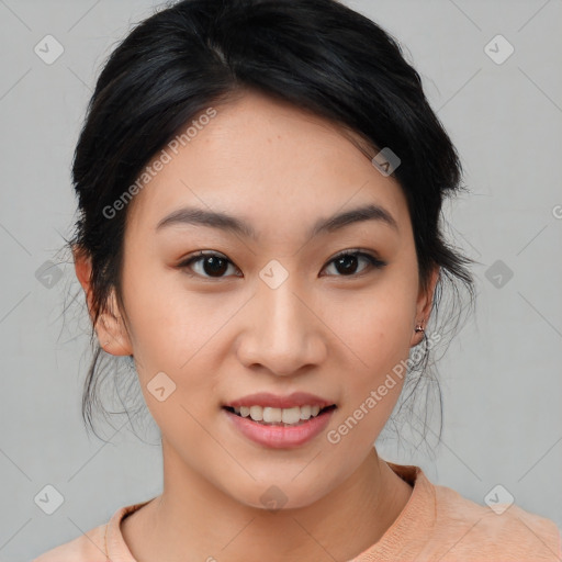 Joyful asian young-adult female with medium  black hair and brown eyes