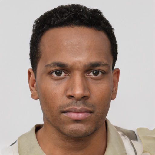 Neutral black young-adult male with short  black hair and brown eyes