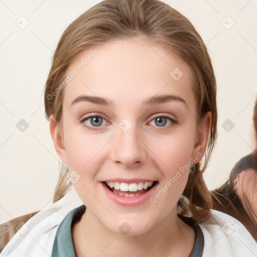 Joyful white young-adult female with medium  brown hair and blue eyes