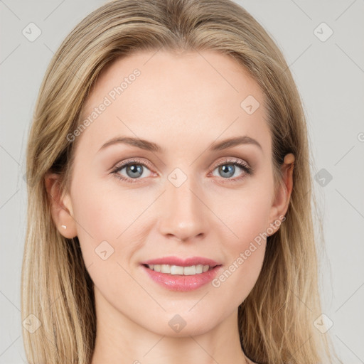 Joyful white young-adult female with long  brown hair and blue eyes