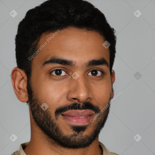 Joyful latino young-adult male with short  brown hair and brown eyes