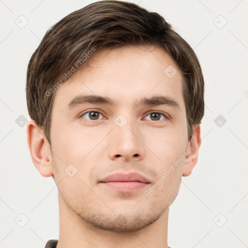 Neutral white young-adult male with short  brown hair and grey eyes