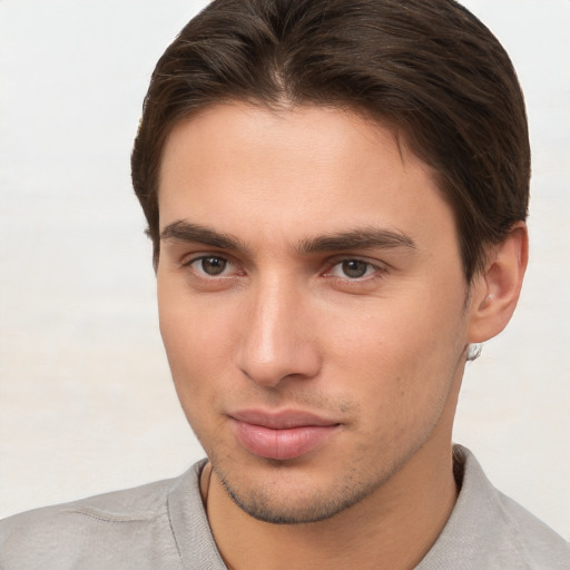 Neutral white young-adult male with short  brown hair and brown eyes