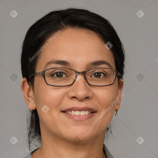 Joyful white adult female with medium  brown hair and brown eyes