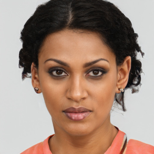Neutral latino young-adult female with short  brown hair and brown eyes