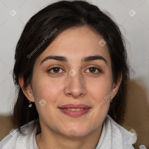 Joyful white adult female with medium  brown hair and brown eyes