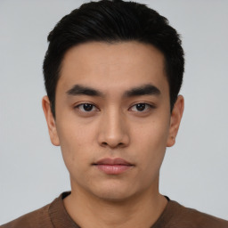 Neutral asian young-adult male with short  black hair and brown eyes