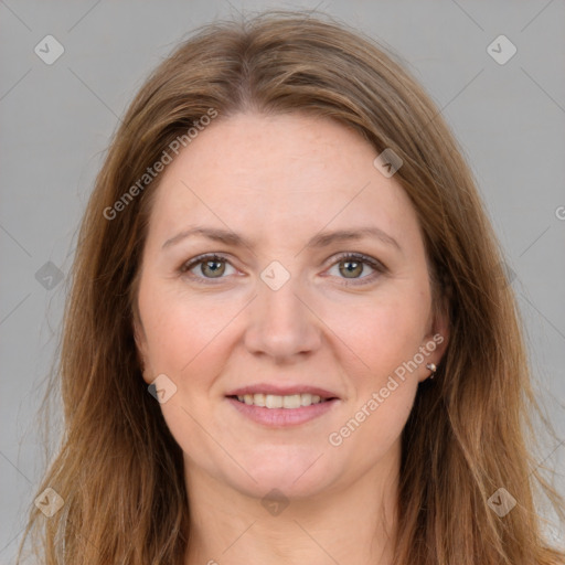 Joyful white young-adult female with long  brown hair and grey eyes