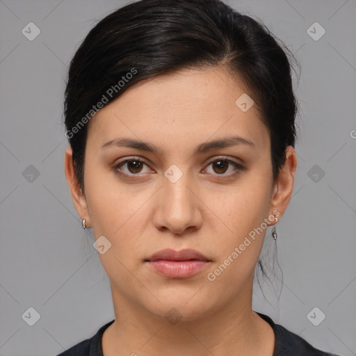 Neutral white young-adult female with medium  brown hair and brown eyes