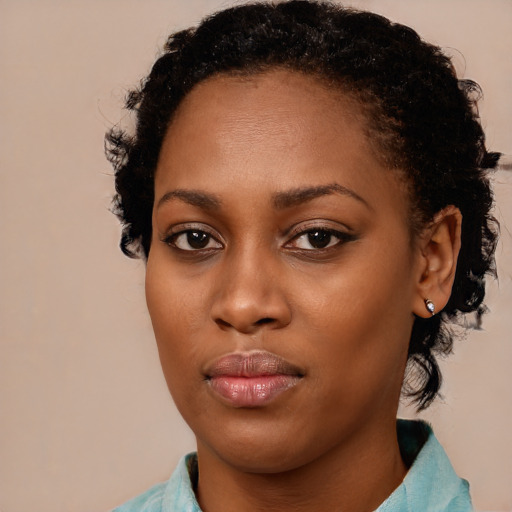 Neutral black young-adult female with medium  brown hair and brown eyes