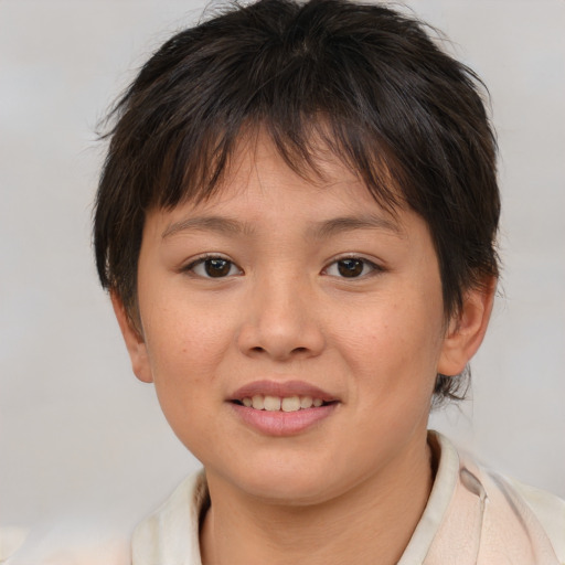 Joyful white child female with short  brown hair and brown eyes