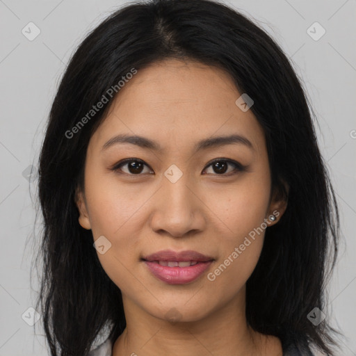 Joyful latino young-adult female with long  brown hair and brown eyes