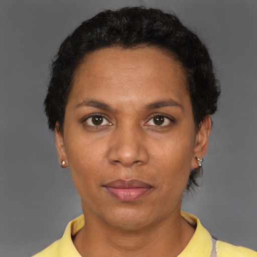 Neutral black adult female with short  brown hair and brown eyes