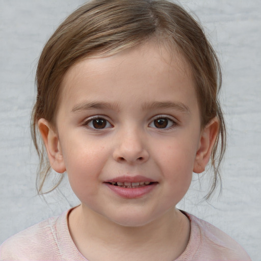 Joyful white child female with medium  brown hair and brown eyes