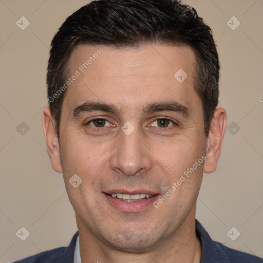 Joyful white adult male with short  brown hair and brown eyes