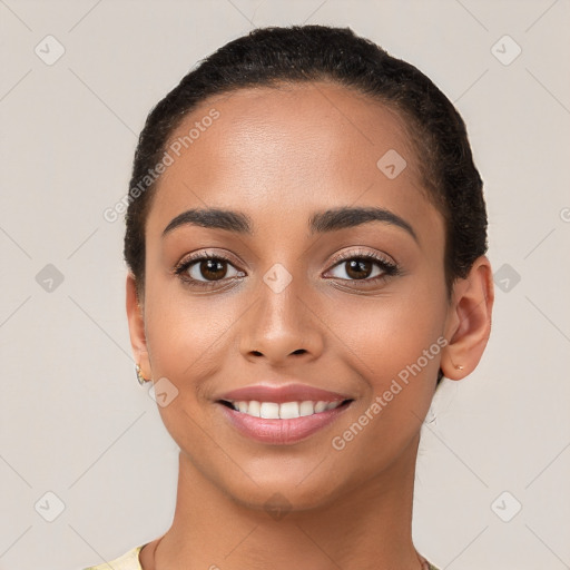 Joyful latino young-adult female with short  brown hair and brown eyes