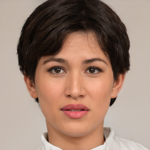 Neutral white young-adult female with short  brown hair and brown eyes