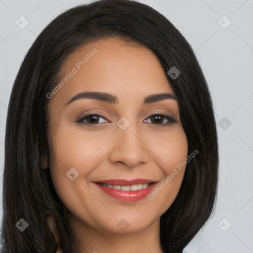 Joyful latino young-adult female with long  brown hair and brown eyes