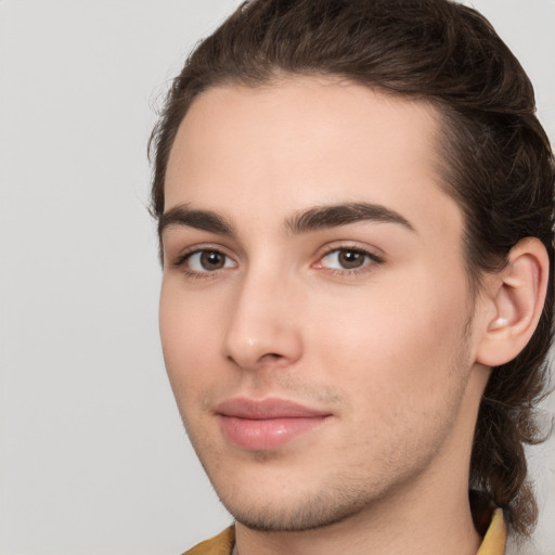 Neutral white young-adult male with medium  brown hair and brown eyes