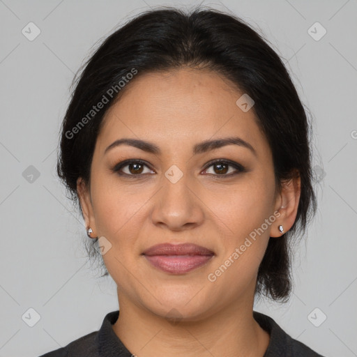 Joyful latino young-adult female with medium  brown hair and brown eyes