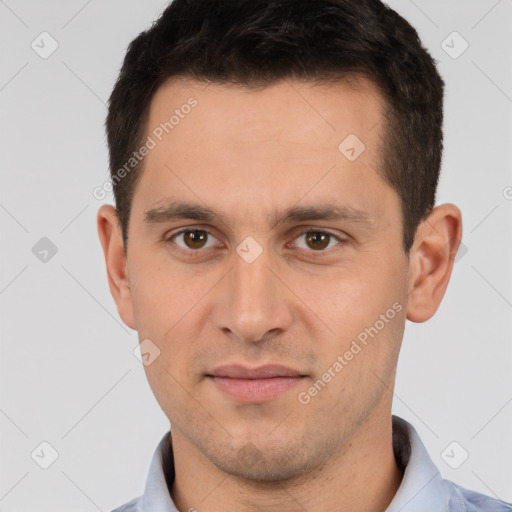 Joyful white young-adult male with short  brown hair and brown eyes