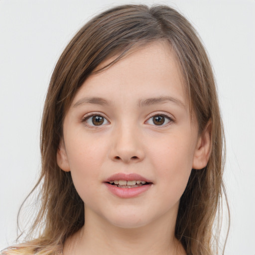 Joyful white child female with long  brown hair and brown eyes